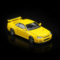 Motorhelix 1/64 Nissan Skyline GT‑R (R34) V‑SpecII Customized Yellow - GT Hobby Store