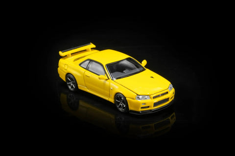 Motorhelix 1/64 Nissan Skyline GT‑R (R34) V‑SpecII Customized Yellow - GT Hobby Store