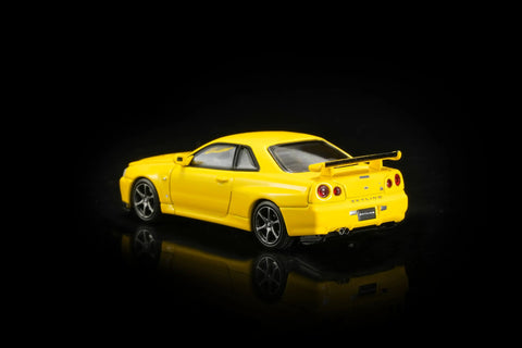 Motorhelix 1/64 Nissan Skyline GT‑R (R34) V‑SpecII Customized Yellow - GT Hobby Store