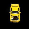Motorhelix 1/64 Nissan Skyline GT‑R (R34) V‑SpecII Customized Yellow - GT Hobby Store