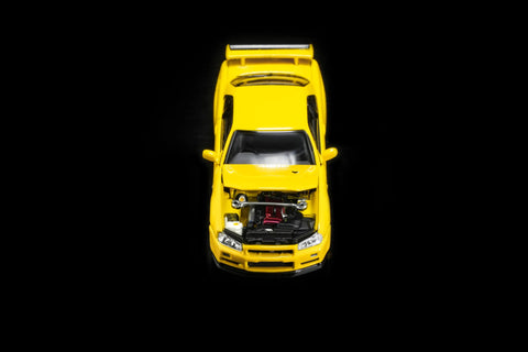 Motorhelix 1/64 Nissan Skyline GT‑R (R34) V‑SpecII Customized Yellow - GT Hobby Store