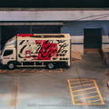 Tarmac Works 1:64 Mitsubishi Fuso Canter Coca - Cola – White – Truck64 - GT Hobby Store