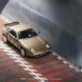 Tarmac Works 1:64 Porsche 928 S4 – Platinum Metallic - Global64 - GT Hobby Store